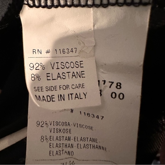 Moncler Midi Dress – Black/White with Gold Stripe Detailing
Size Small - Picture 7 of 7